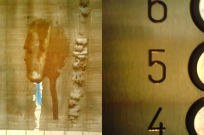 skvrna na výtahových dveřích v podobě obličeje